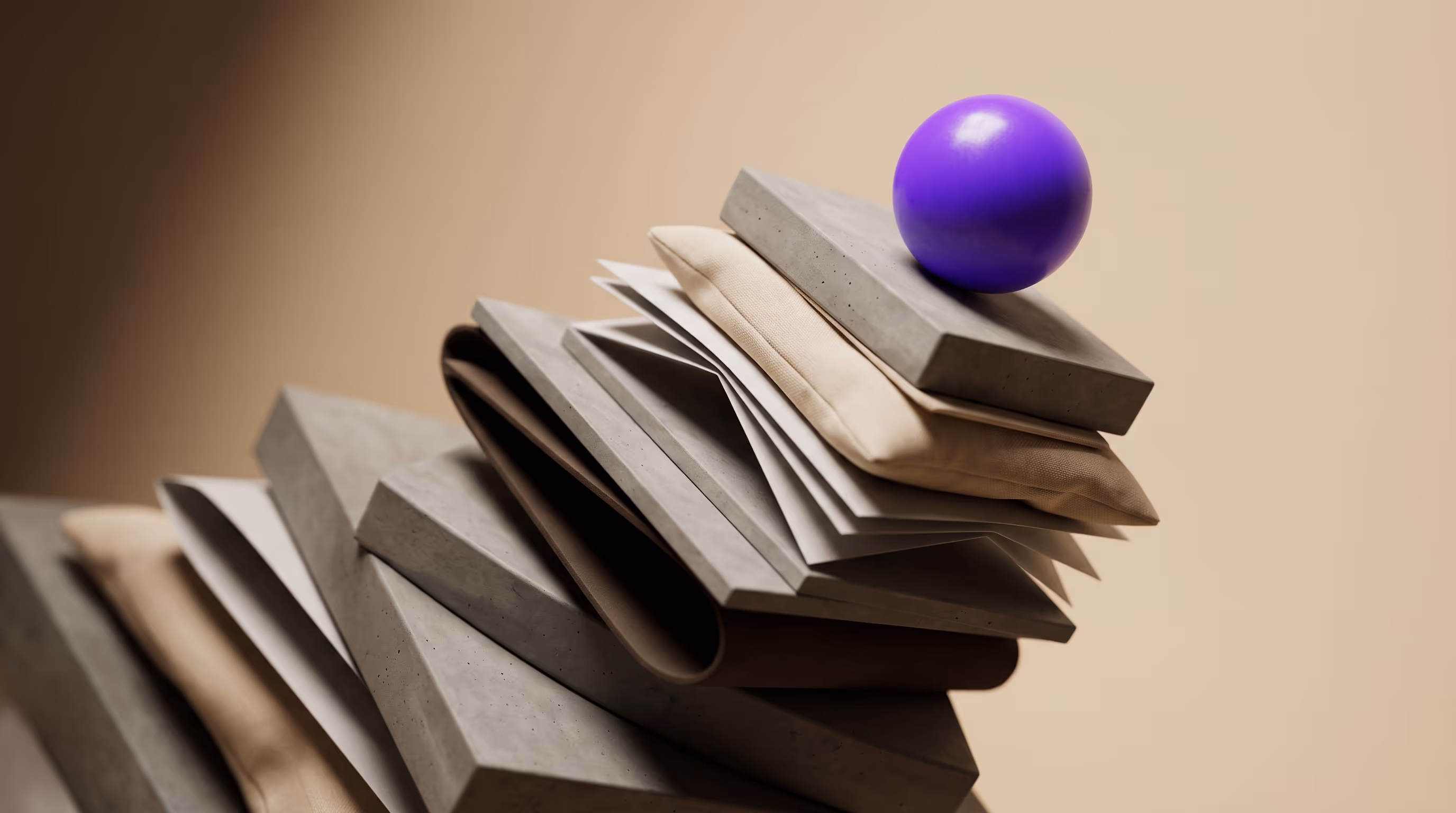 A single bright purple sphere crowning an ascending diagonal stack of concrete planes, folded paper and soft fabric under dramatic side light, representing revenue rising to a peak.
